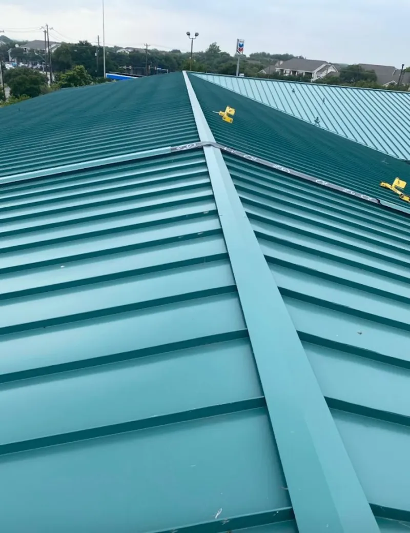 Green commercial metal roof ridge and valley for Metal Roof Repair in Kingsburg